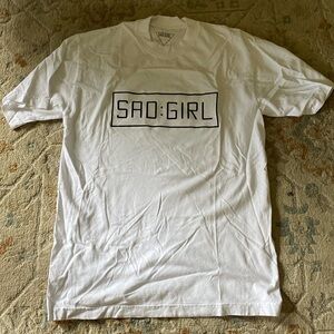 White graphic tee. Sad Girl Hours brand - goal of uplifting girls in sports!!